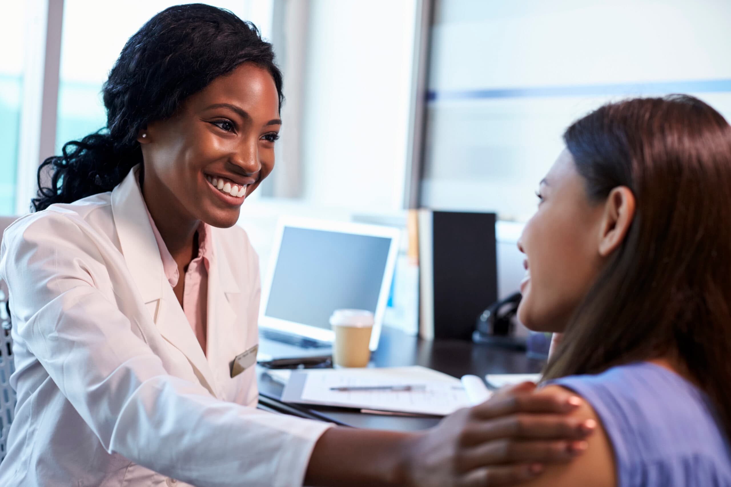 A doctor meeting with a patient